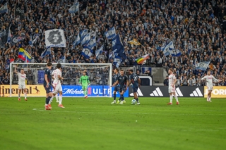 San Diego FC players stand at midfield during their inaugural home match against St. Louis City SC on Sat. March 1, 2025 at Snapdragon Stadium.