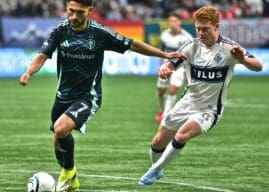 Whitecaps at sea against Sounders